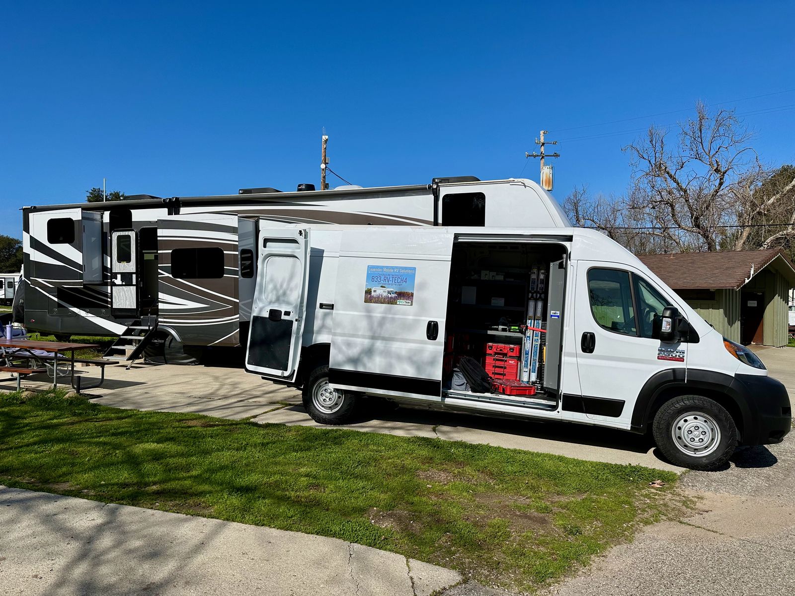 Lavender Mobile RV Solutions branded service van parked beside a fifth-wheel RV in Santa Barbara County
