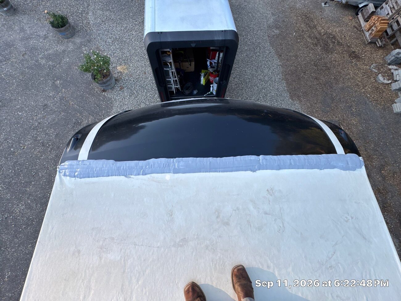 RV front cap resealed with a fresh bead of self-leveling lap sealant on a Grand Design Solitude